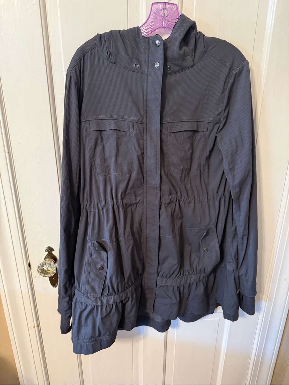 Lululemon Apres Practice Anorak jacket in the "Coal" colorway.
